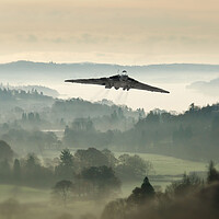 Buy canvas prints of Vulcan In The Mist by J Biggadike
