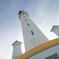 Buy canvas prints of Covesea Skerries Lighthouse by J Biggadike