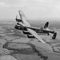 Buy canvas prints of Lincolnshires Lancaster Bomber  by J Biggadike
