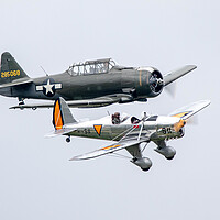 Buy canvas prints of T6 Texan and Ryan ST-A S11 by J Biggadike