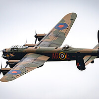 Buy canvas prints of Lancaster Bomber PA474 by J Biggadike