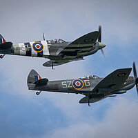 Buy canvas prints of Spitfire AB910 and TE311 by J Biggadike