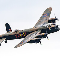 Buy canvas prints of Avro Lancaster Bomber PA474 by J Biggadike
