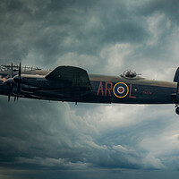 Buy canvas prints of Lancaster Bomber Dark Sky by J Biggadike