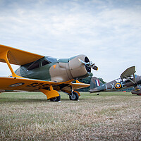 Buy canvas prints of Staggerwing Lysander and Mustang by J Biggadike