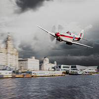 Buy canvas prints of Spitfire over Liverpool by J Biggadike