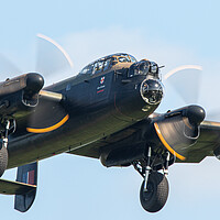 Buy canvas prints of The Avro Lancaster Bomber by J Biggadike