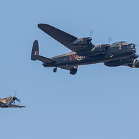 Buy canvas prints of BBMF Lancaster and Spitfire by J Biggadike