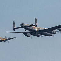 Buy canvas prints of Lancaster Bomber with Spitfire MK356 by J Biggadike