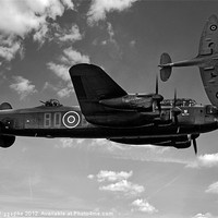 Buy canvas prints of Avro Lancaster with Spitfire by J Biggadike