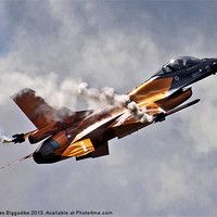 Buy canvas prints of Orange F-16 by J Biggadike