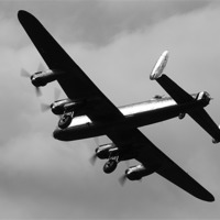 Buy canvas prints of Lancaster bomber by J Biggadike