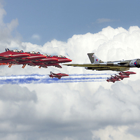 Buy canvas prints of Reds Arrows with XH558 by J Biggadike