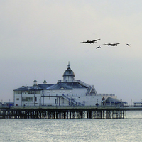 Buy canvas prints of Over the Pier  by J Biggadike