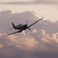 Buy canvas prints of Dawn Of The Spitfire  by J Biggadike