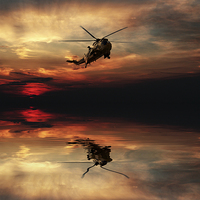 Buy canvas prints of Sea King Sunset  by J Biggadike