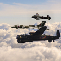 Buy canvas prints of Avro Lancasters and Vulcan  by J Biggadike