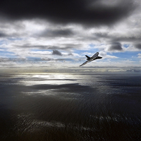 Buy canvas prints of Vulcan Over The Channel  by J Biggadike
