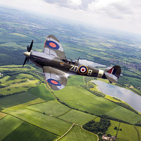 Buy canvas prints of Spitfire Countryside Tour  by J Biggadike
