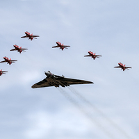Buy canvas prints of Vulcan and Reds Run In by J Biggadike