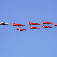 Buy canvas prints of Vulcan With The Red Arrows by J Biggadike
