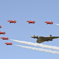 Buy canvas prints of XH558 with The Reds Arrows by J Biggadike