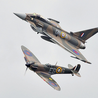 Buy canvas prints of Typhoon and Spitfire  by J Biggadike