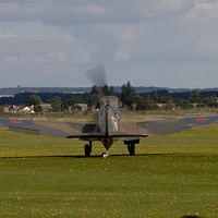 Buy canvas prints of Spitfire Taxi by J Biggadike