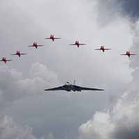 Buy canvas prints of Red Arrows Vulcan Bomber by J Biggadike