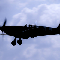 Buy canvas prints of Bluelight Spitfire by J Biggadike