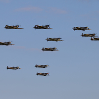 Buy canvas prints of The Spitfires by J Biggadike