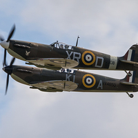 Buy canvas prints of Spitfire Duo by J Biggadike
