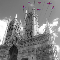 Buy canvas prints of Reds Over The Cathedral by J Biggadike