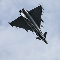 Buy canvas prints of Typhoon Over The Top by J Biggadike