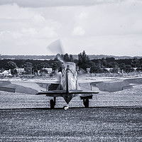 Buy canvas prints of Spitfire Taxi Out by J Biggadike