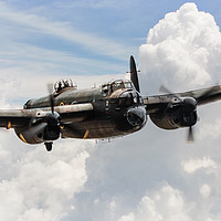 Buy canvas prints of Lancaster Bomber Portrait Of An Icon by J Biggadike