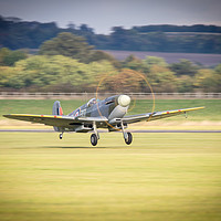 Buy canvas prints of Spitfire MH434 Takes Off by J Biggadike