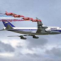 Buy canvas prints of BOAC Special Livery 747 with The Red Arrows by J Biggadike
