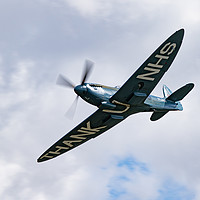 Buy canvas prints of The NHS Spitfire by J Biggadike
