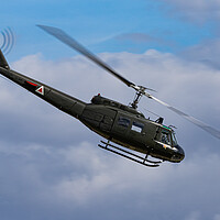 Buy canvas prints of Huey Helicopter by J Biggadike