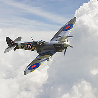 Buy canvas prints of Spitfire A Flying Legend by J Biggadike