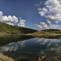 Buy canvas prints of Snowdonia Lake Reflections by Matthew Bates