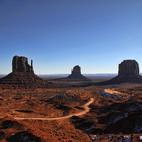 Buy canvas prints of  Monument Valley track by Matthew Bates