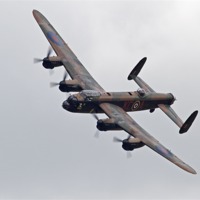 Buy canvas prints of Lancaster Bomber by John Biggadike