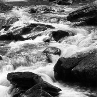Buy canvas prints of Welsh Rapids black and white by Dan Davidson