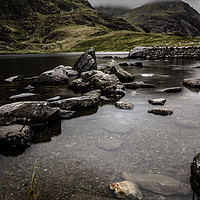Buy canvas prints of Stepping over Snowdonia by Dan Davidson