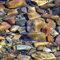 Buy canvas prints of  Ripples on the Pebbles by Lynn Bolt