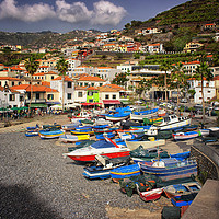 Buy canvas prints of Colourful Fishing Boats in Madeira by Lynn Bolt