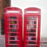 Buy canvas prints of Phone boxes and a window by Nathan Wright