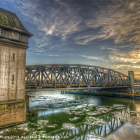 Buy canvas prints of Bridge over icey waters by Nathan Wright